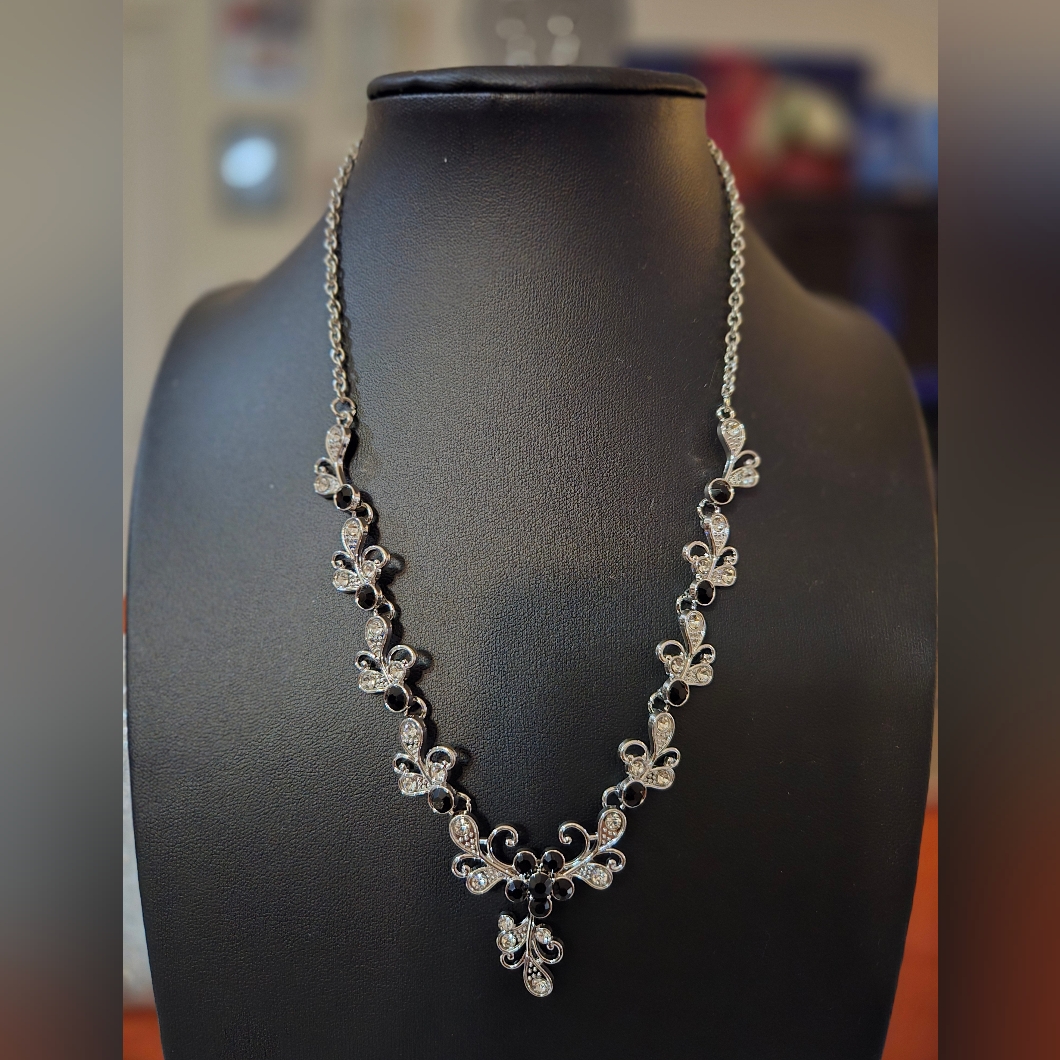 Elegant Silver-Tone Floral Necklace With Black Accents